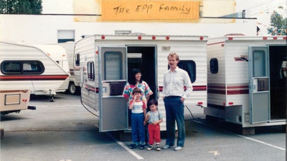 Epp (center) poses with his parents and brother at the ϳԹ Manufacturing plant, 1986