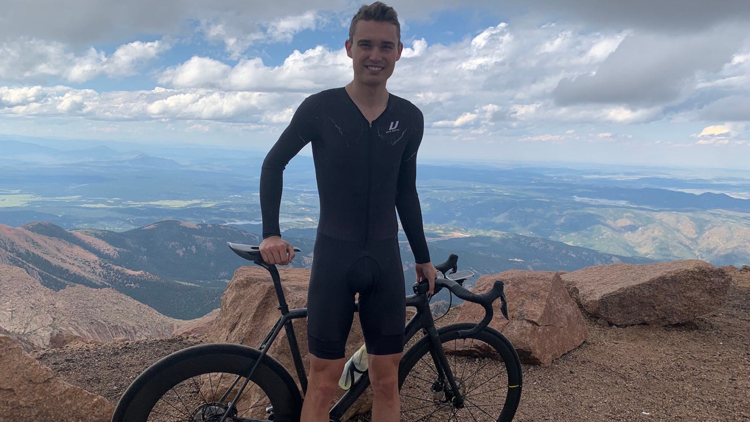 Deuel at the summit of Pikes Peak with the mismatched wheelset that he sported for a few years