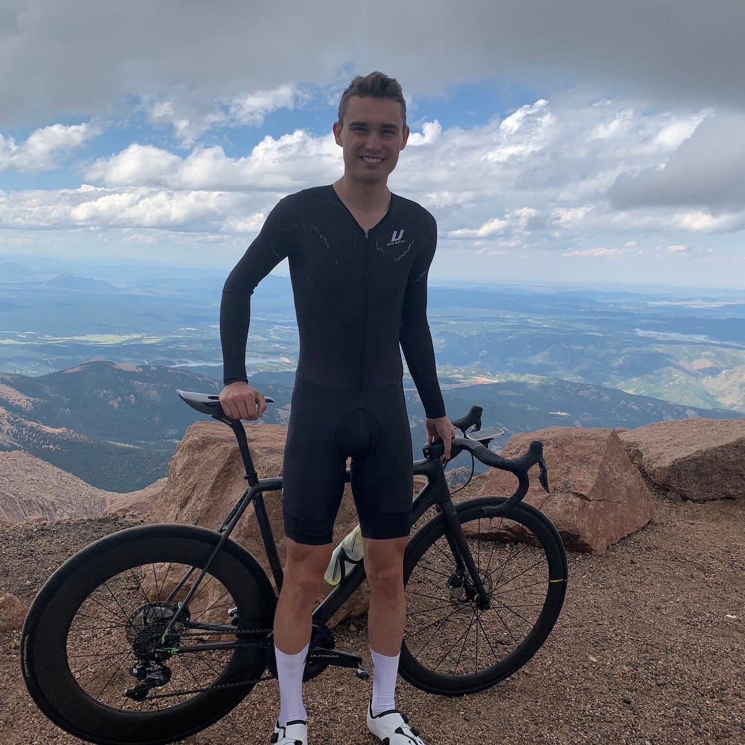 Deuel at the summit of Pikes Peak with the mismatched wheelset that he sported for a few years