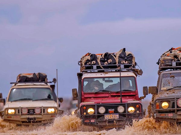 I’m pretty sure that’s me, driving the red Toyota Hilux, somewhere north of Mount Dare, Australia.