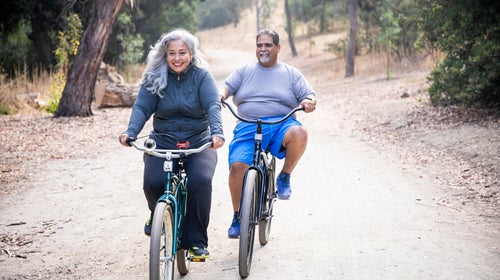 Senior Mexican Couple Riding Bikes