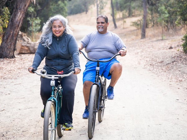 Senior Mexican Couple Riding Bikes