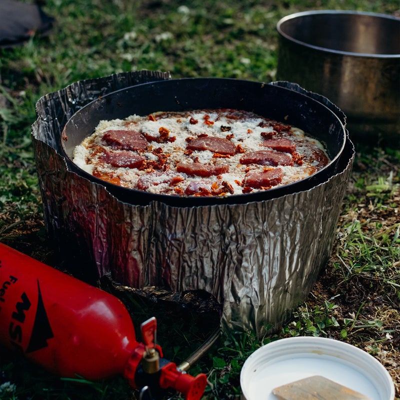 https://cdn.outsideonline.com/wp-content/uploads/2021/05/25/nols-backcountry-pizza_s.jpg?width=800