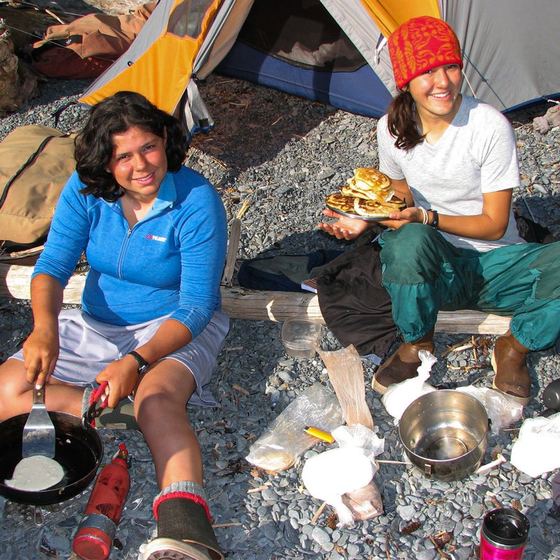 Making pancakes in Alaska on a NOLS trip