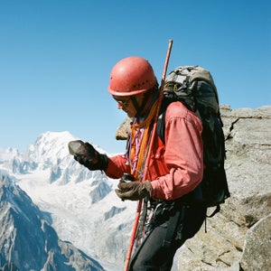 Crystal hunter Christophe Péray holds a smoky quartz that he found on Les Courtes, a  12,561-foot mountain in the French portion of the Mont Blanc massif.