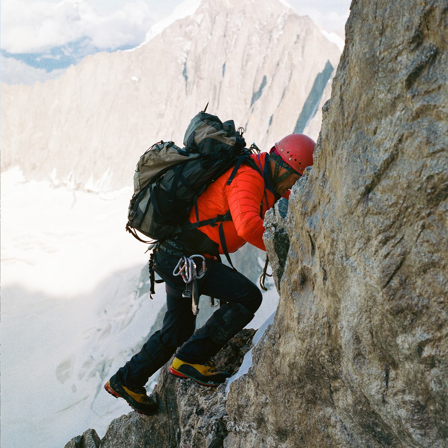 Péray climbs back to the Col des Cristaux after exploring a crystal pocket on the north face of Les Courtes.