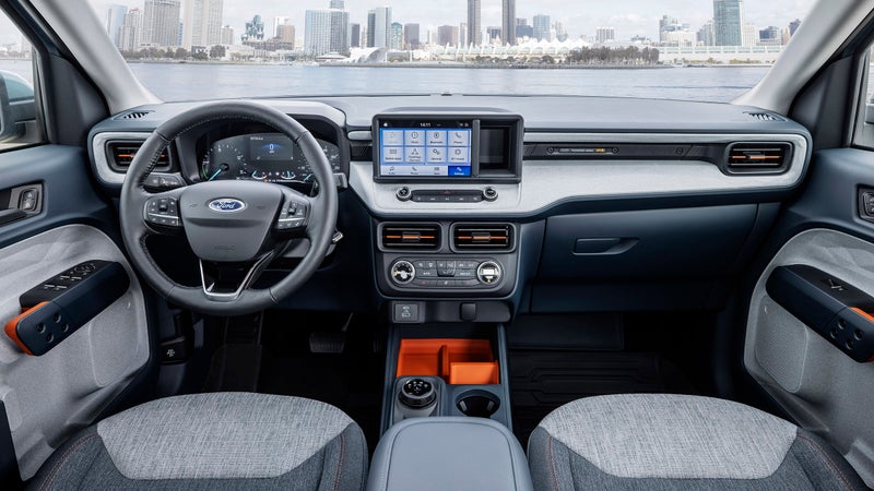 Equipped here with an optional touchscreen center console, the Maverick's interior looks like a genuinely nice place to spend time. The rear seat folds up, revealing a storage bin, and is designed to accommodate a full-size mountain bike with its front wheel removed.