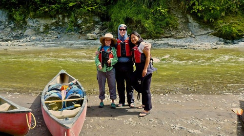 The author (left) and his travel companions on the banks of the Whanganui River