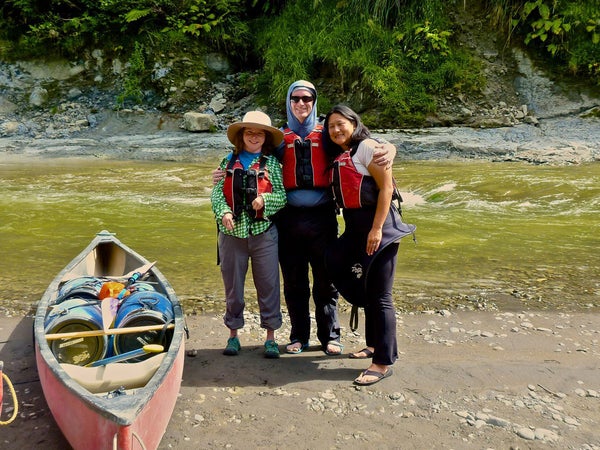The author (left) and his travel companions on the banks of the Whanganui River