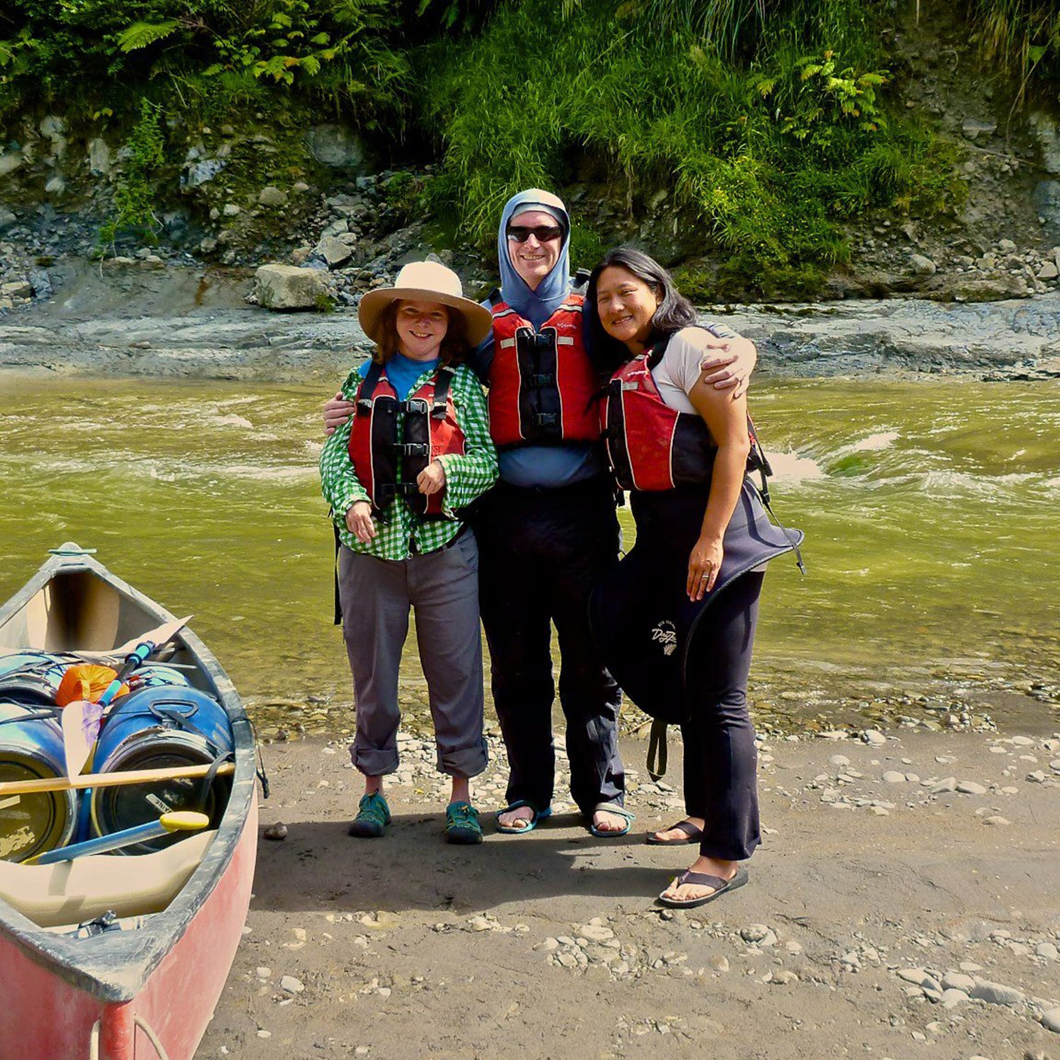 The author (left) and his travel companions on the banks of the Whanganui River