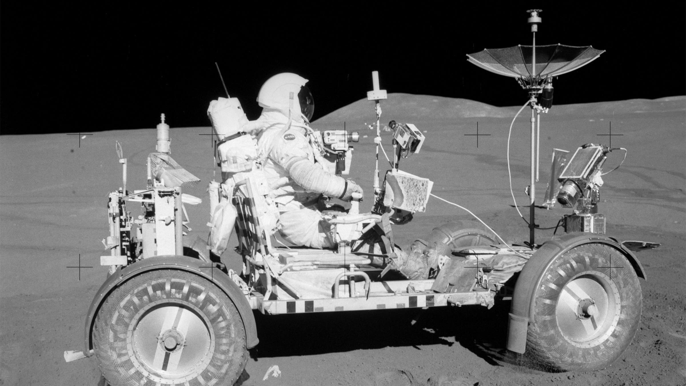 Apollo 15 commander Dave Scott maneuvers the rover before he and Jim Irwin set out on their second drive, in August 1971.