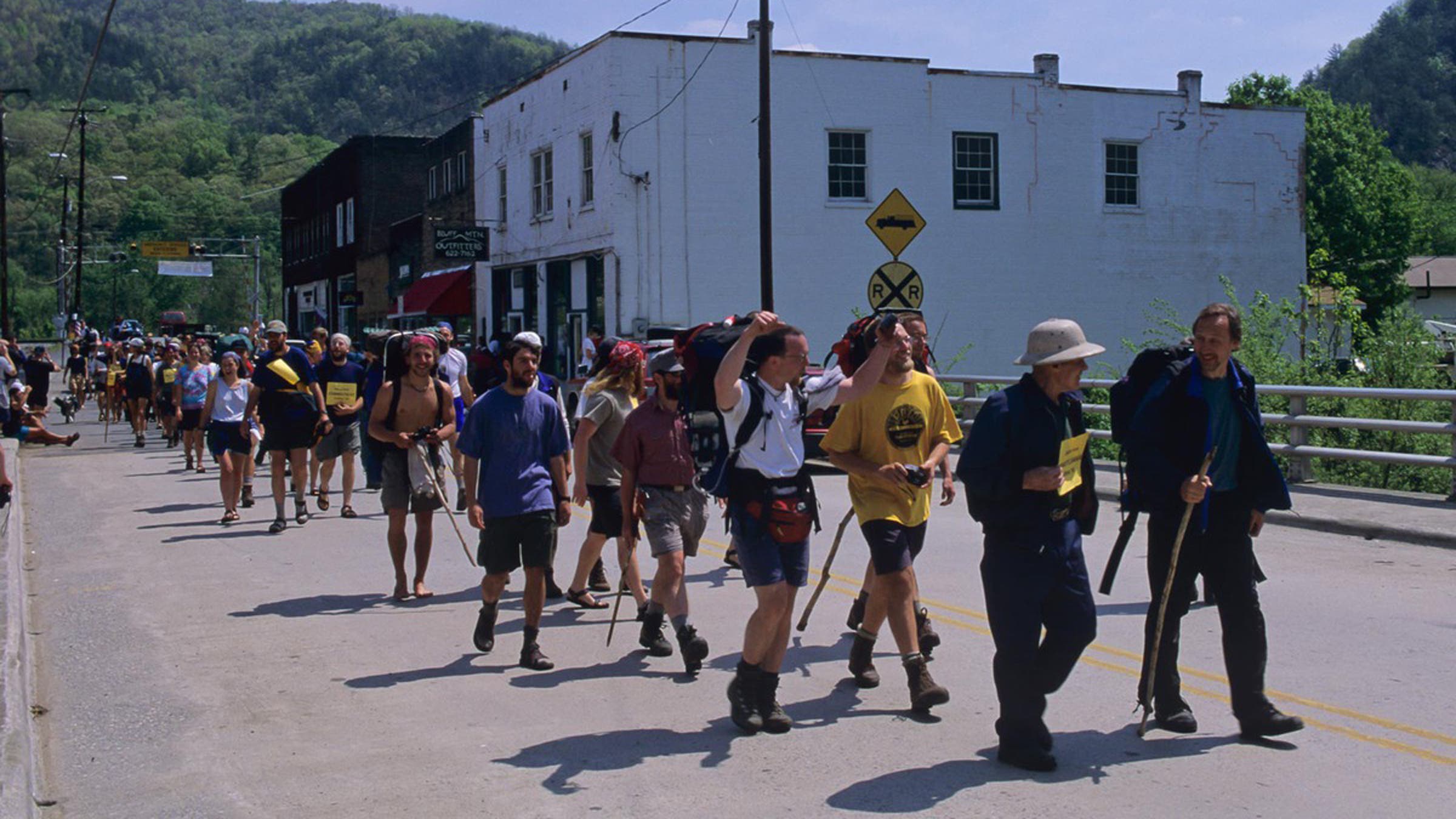 In 1948, Earl Shaffer (wearing the pith helmet) was the first person to complete the entire trail. In this photo he’s leading the Trail Festival Parade in Hot Springs, North Carolina, in 1998.