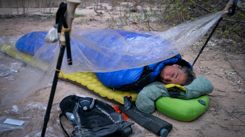 Writer and National Geographic Fellow Dan Buettner wakes up after a night of sleep in luxury accomodation.