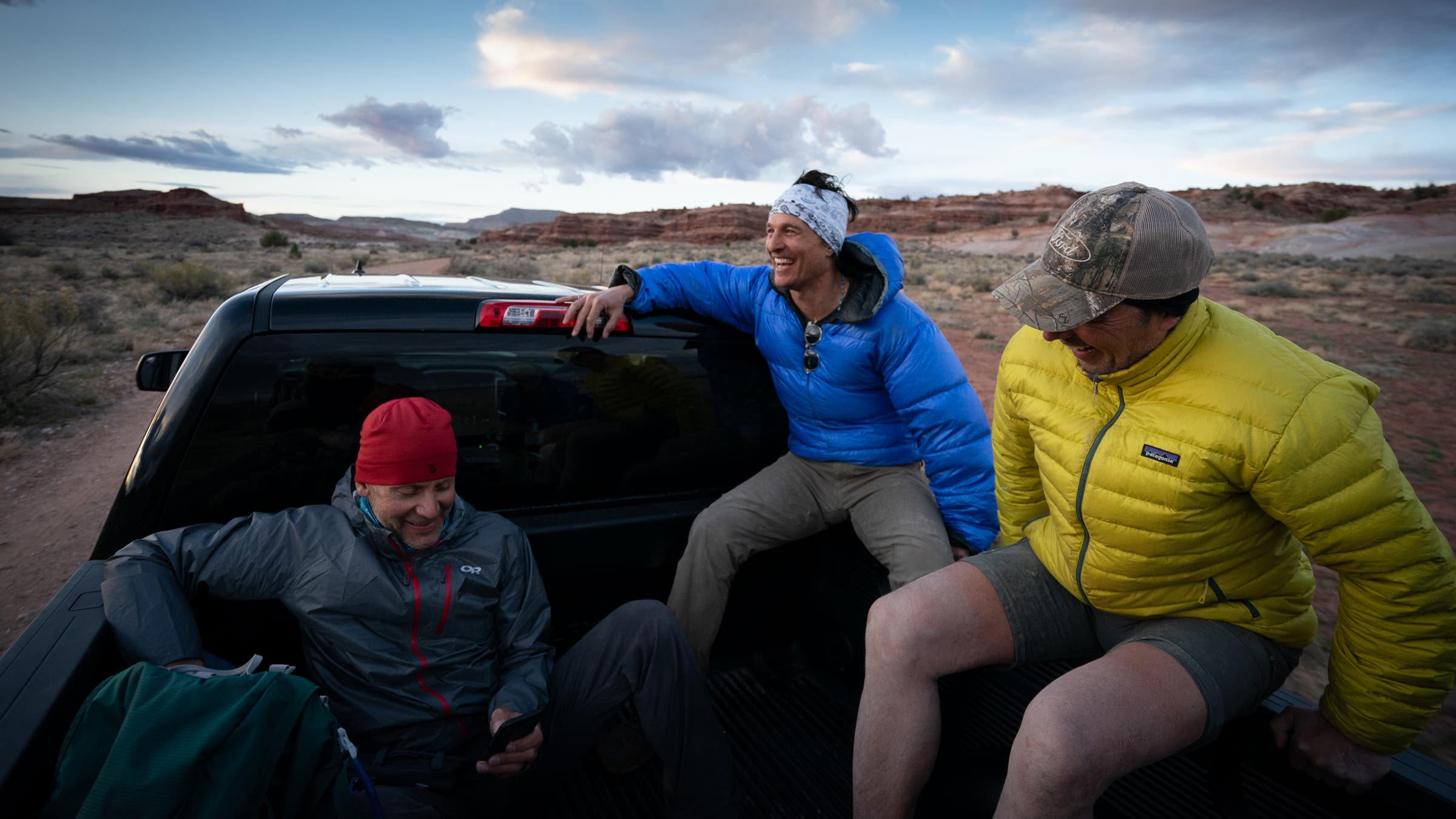 Ali Selim, Matthew Mcconaughey, and Dan Buettner (from left) hitch a ride back to their cars at the end of the trip.