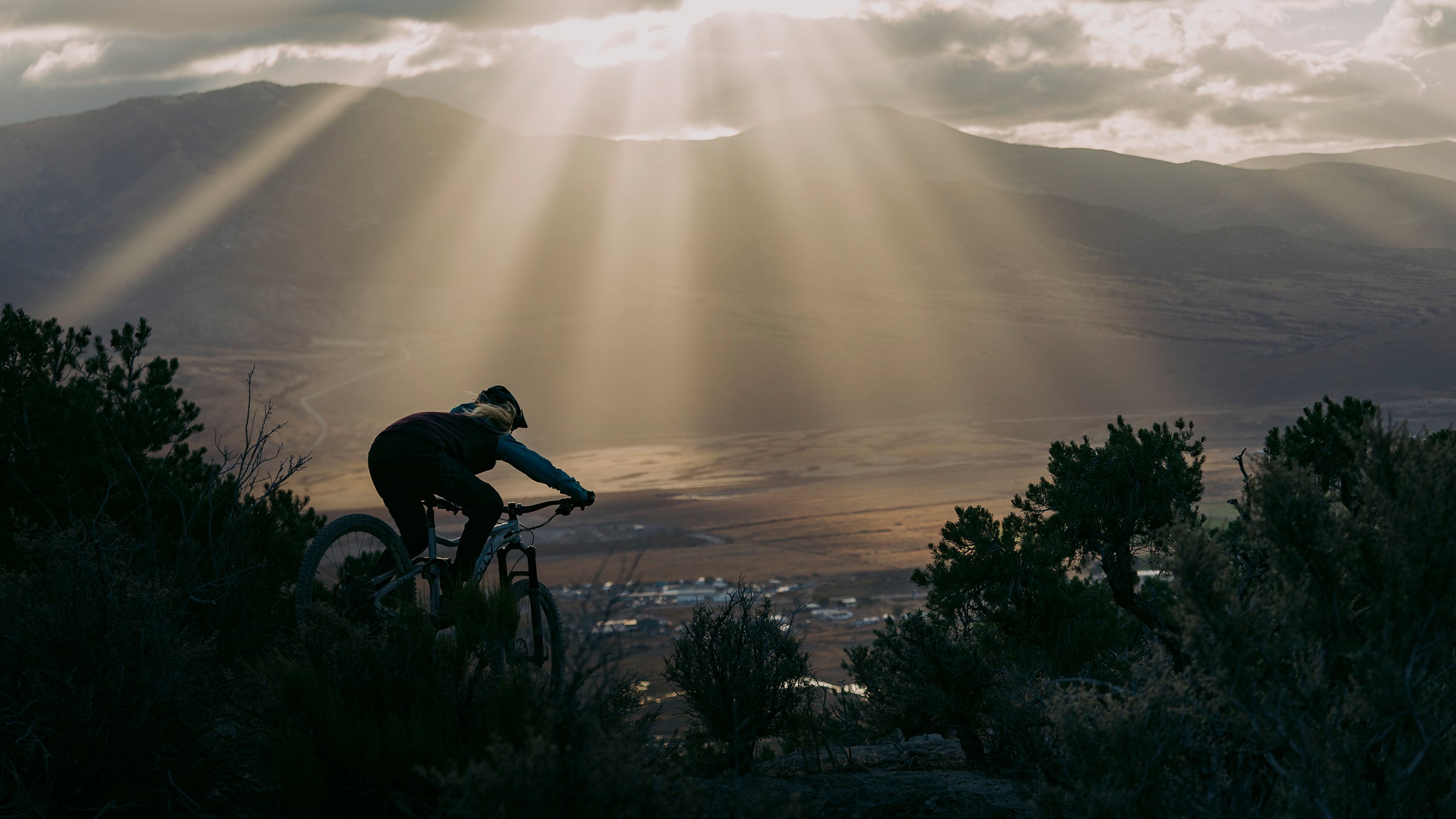 Mountain biker overlooks landscape