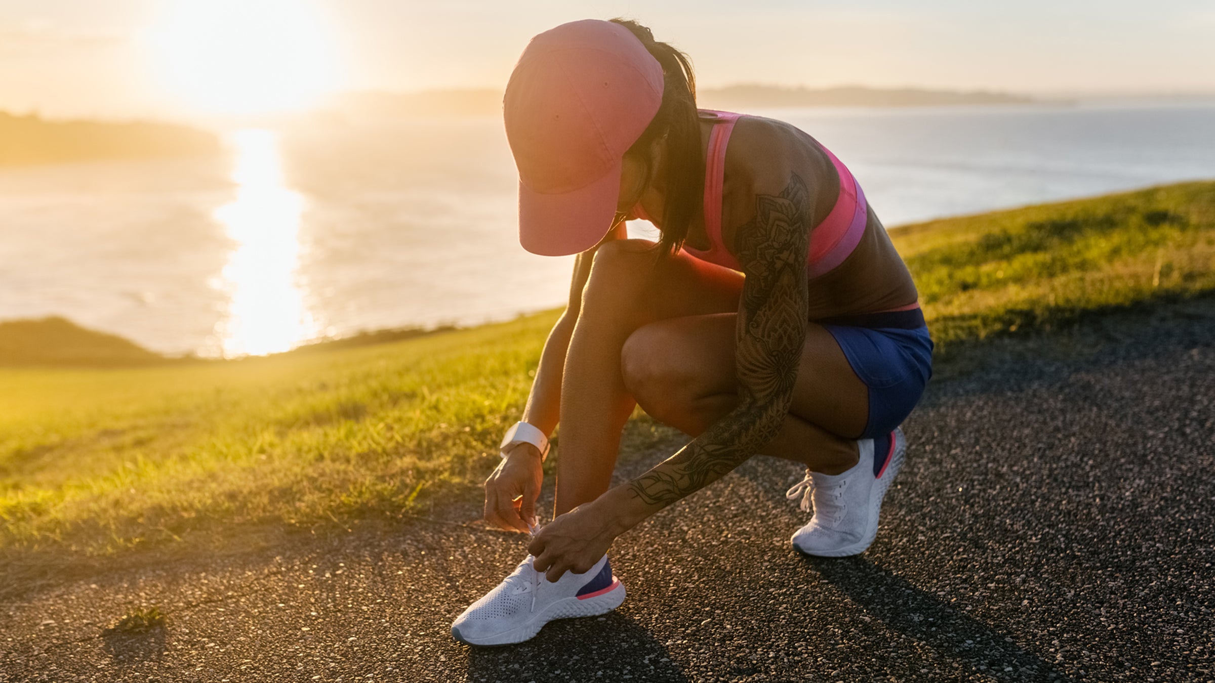 Runner ties shoe in the heat