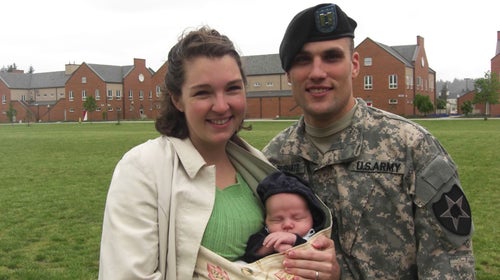 Luke and Amy Bushatz with their newborn son at Luke’s deployment ceremony, May 2009