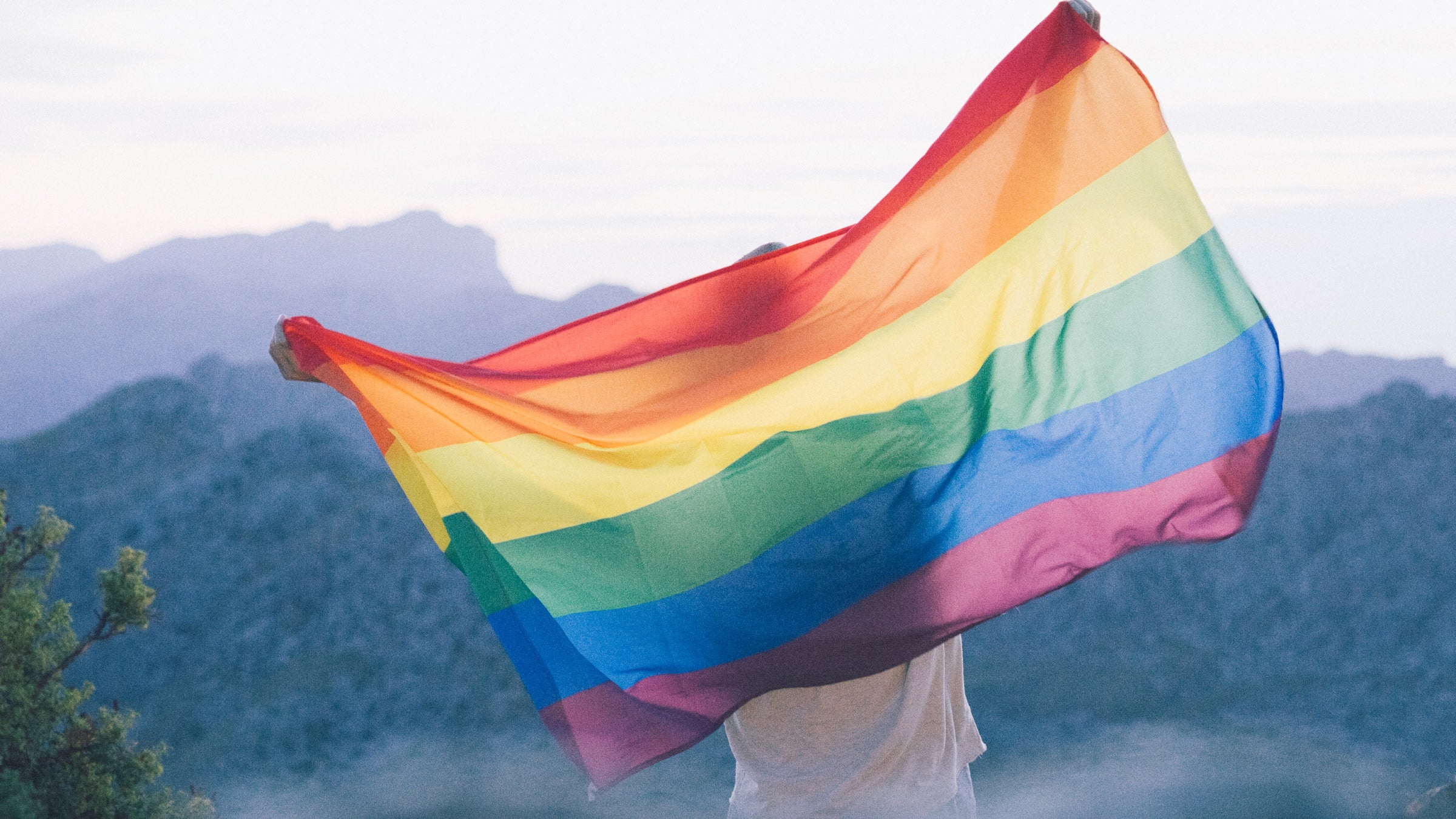 pride flag in mountains