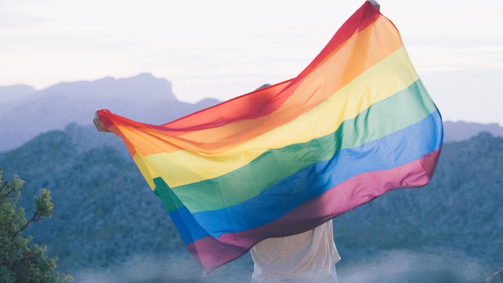 pride flag in mountains. Photo: Getty