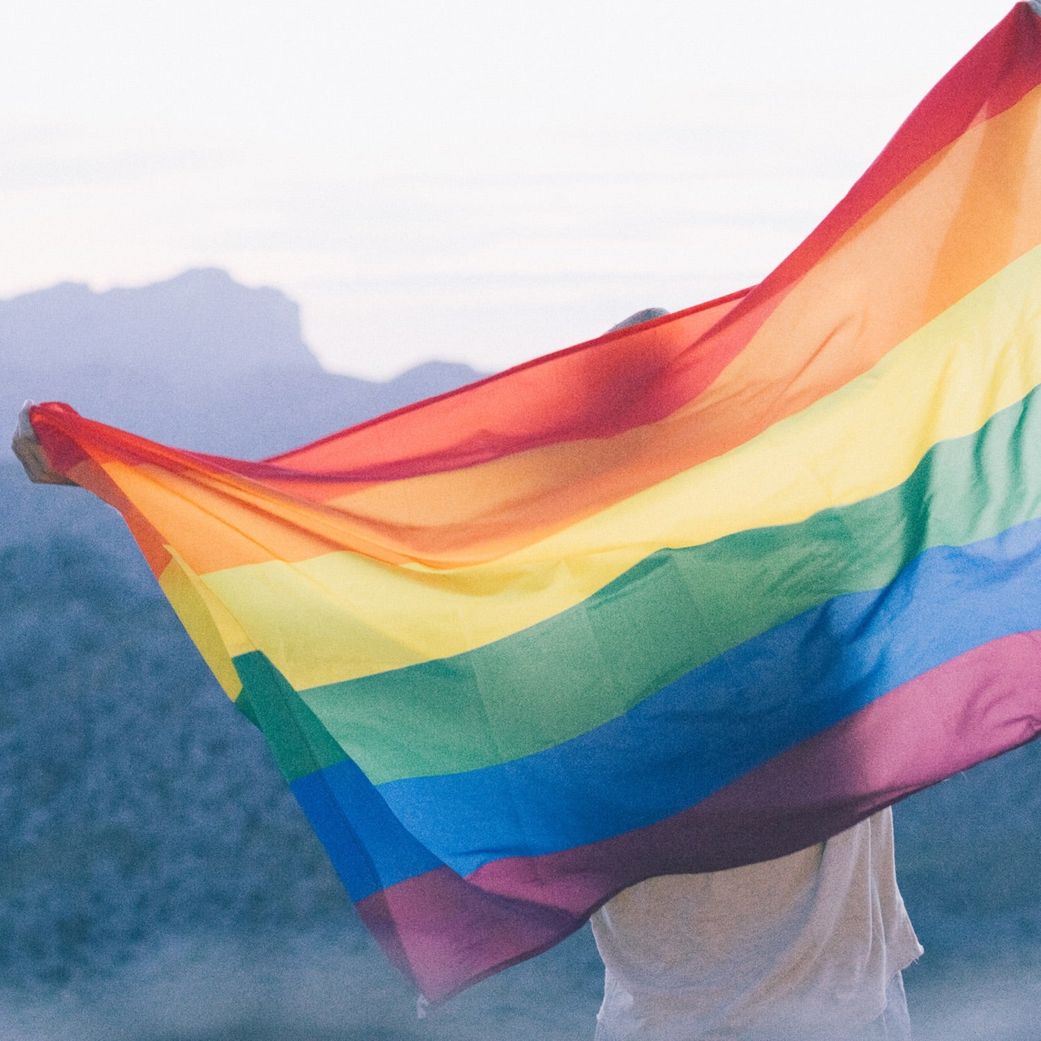 pride flag in mountains