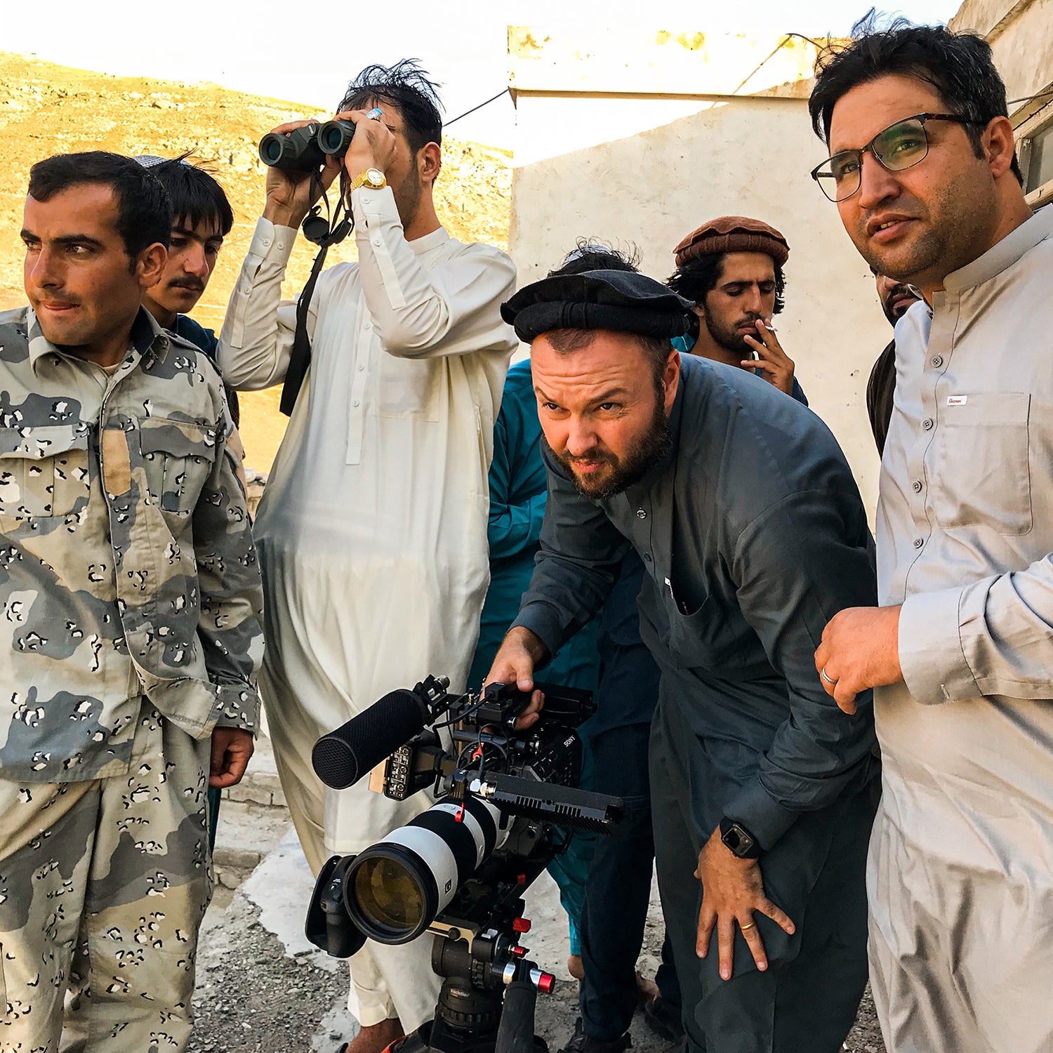 Aziz Tassal and Mark Oltmanns filming at frontline Afghan police outpost in Wardak province, August 2020