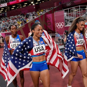 Allyson Felix, Athing Mu, Dalilah Muhammad and Sydney Mclaughlin celebrate after winning the women's 4x400 relay final.
