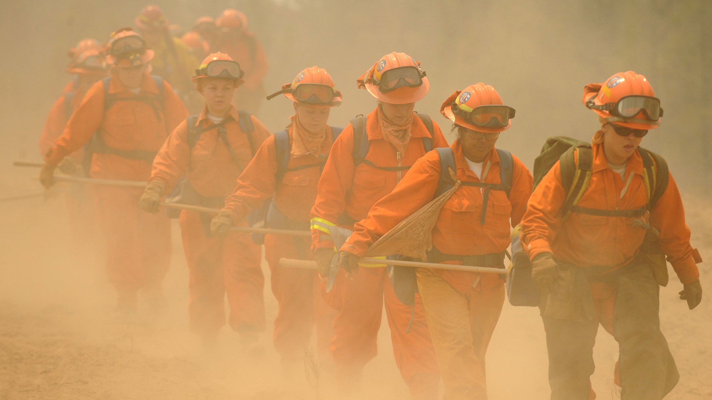 Women inmate firefighters hike to cut fireline