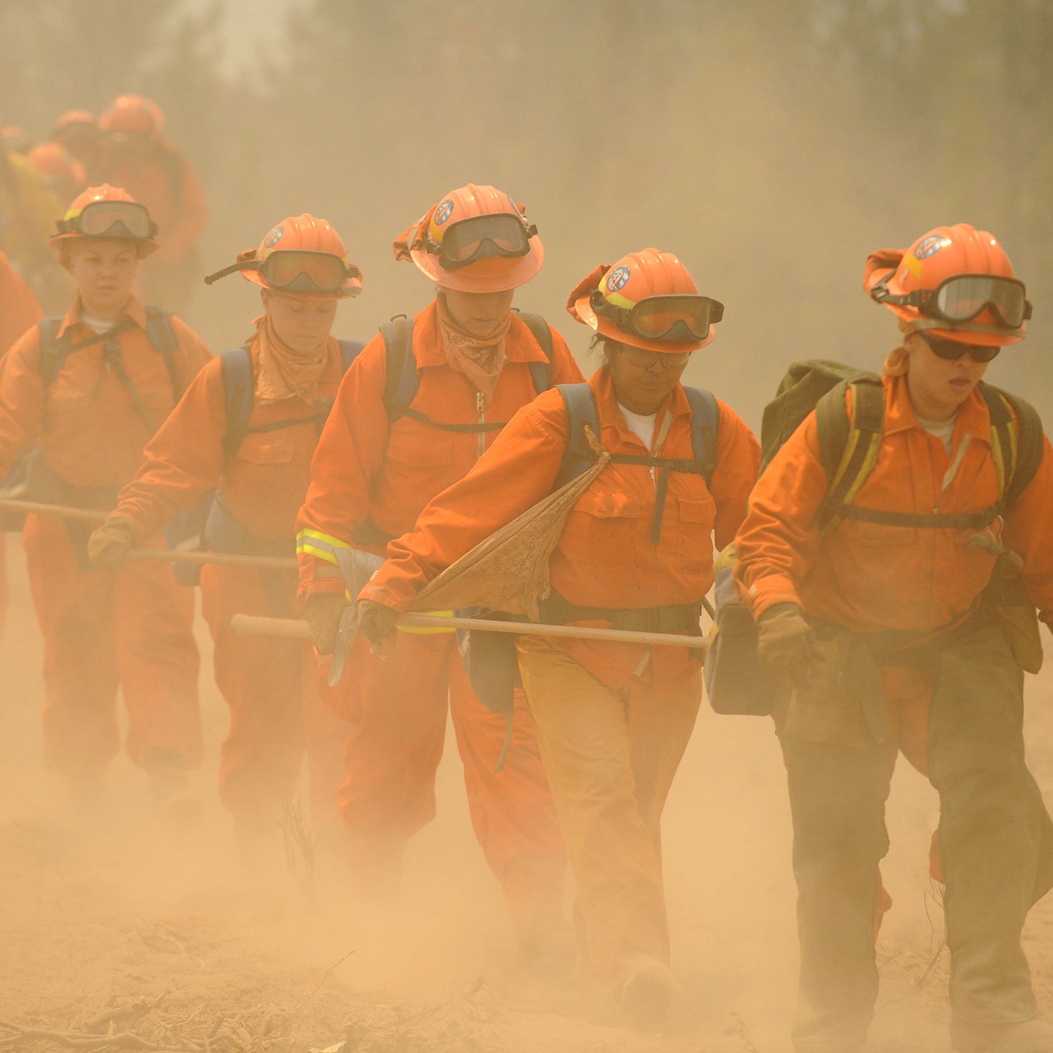 Women inmate firefighters hike to cut fireline