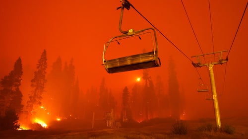 A chairlift at Sierra-at Tahoe ski resort sits idle as the Caldor Fire moves through the area on August 30, 2021 in Twin Bridges, California.