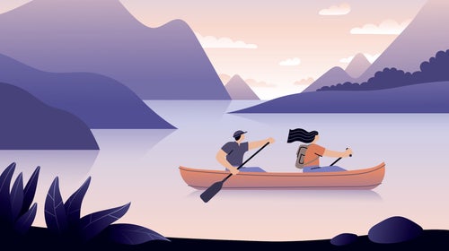 two people canoeing