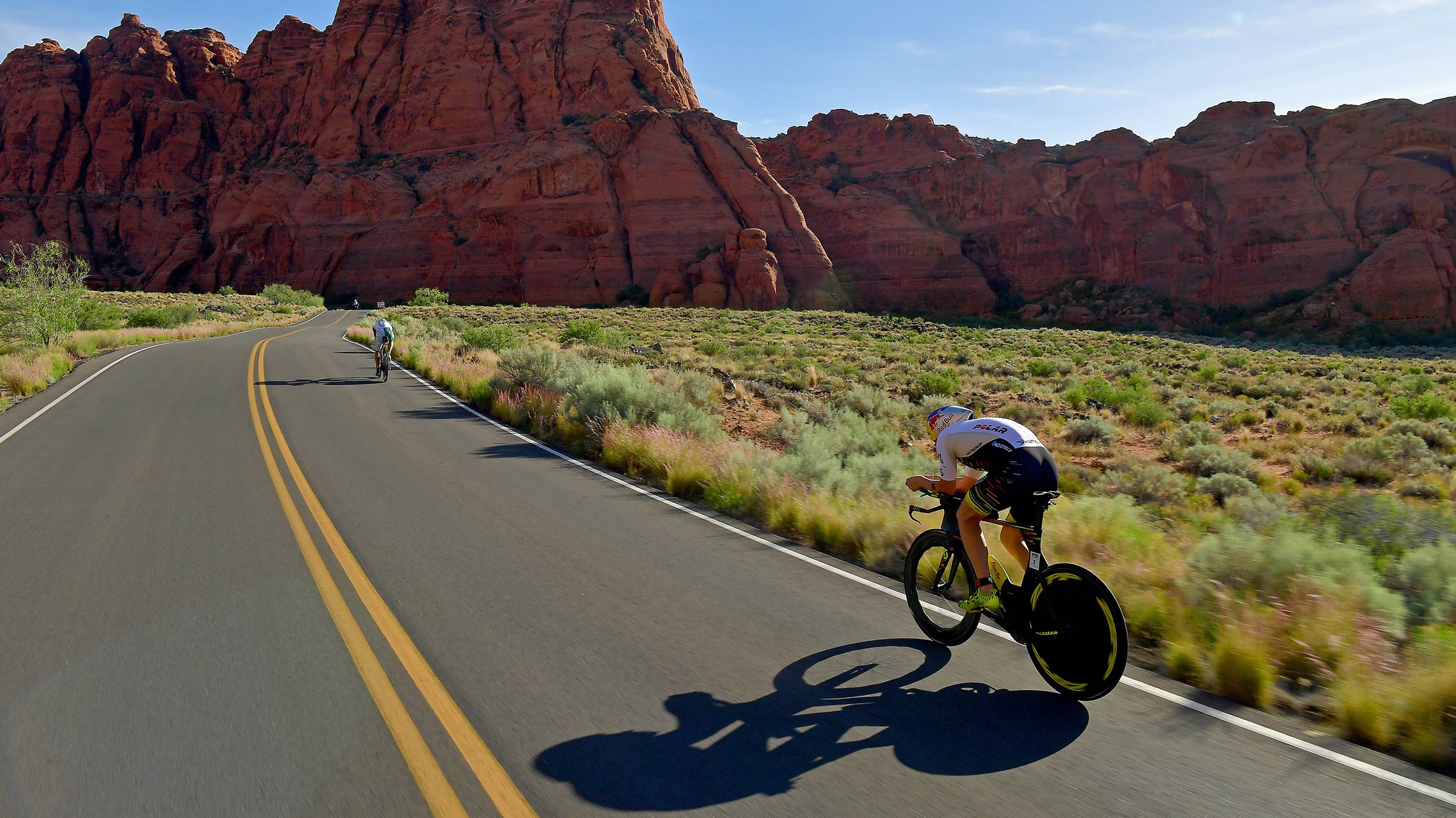 Sebastien Kienle of Germany chases Lionel Sanders of Canada on the bike during the IRONMAN 70.3 St George Utah on May 5, 2018 in St George, Utah.