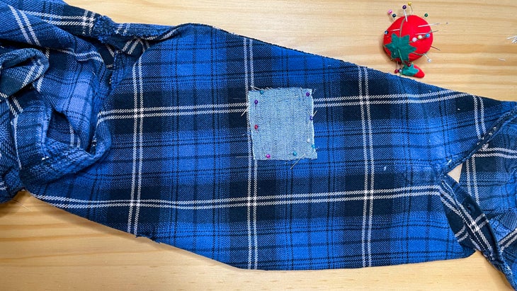 Flannel jacket with outlet elbow patches