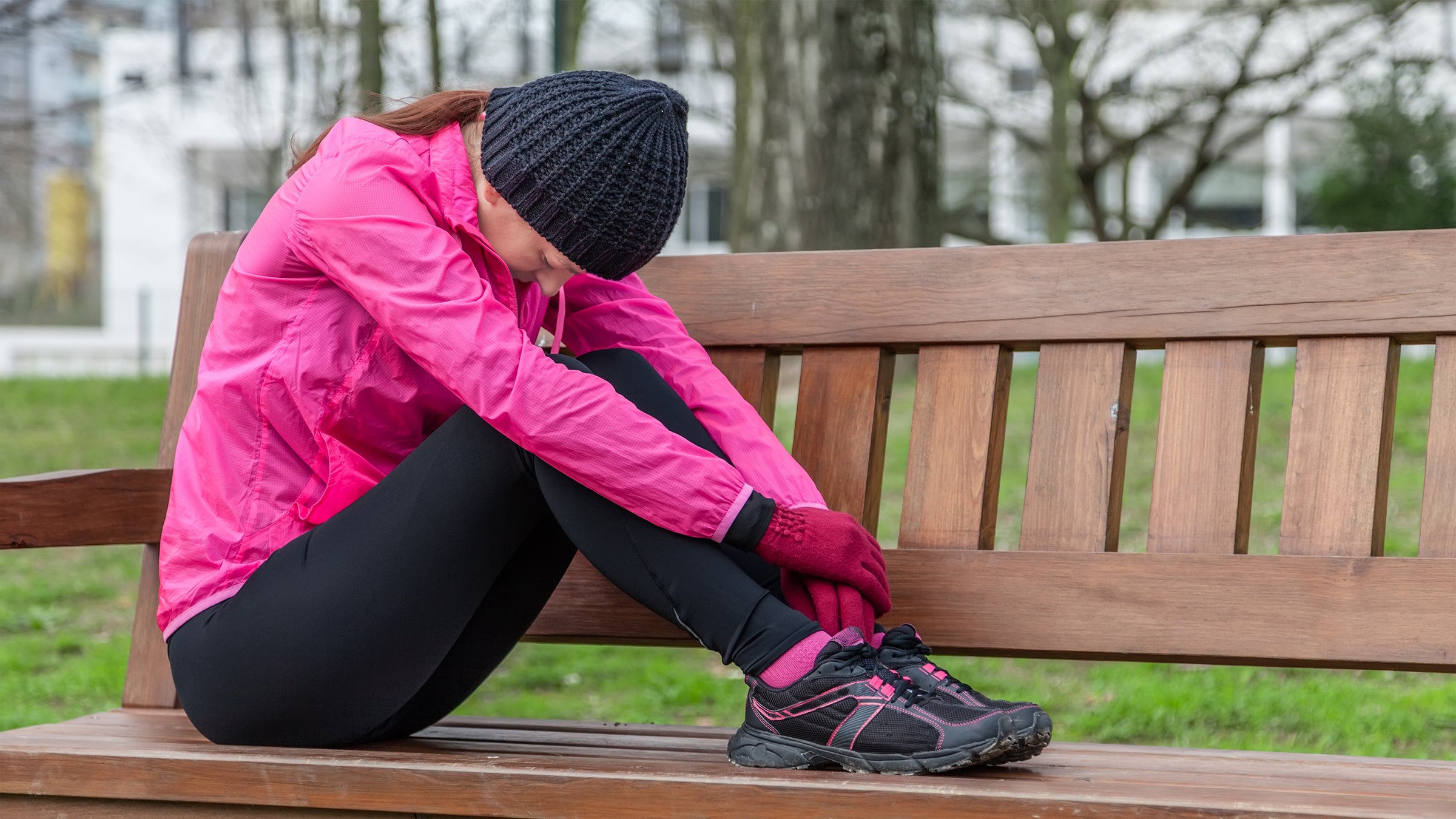 Tired runner on a bench