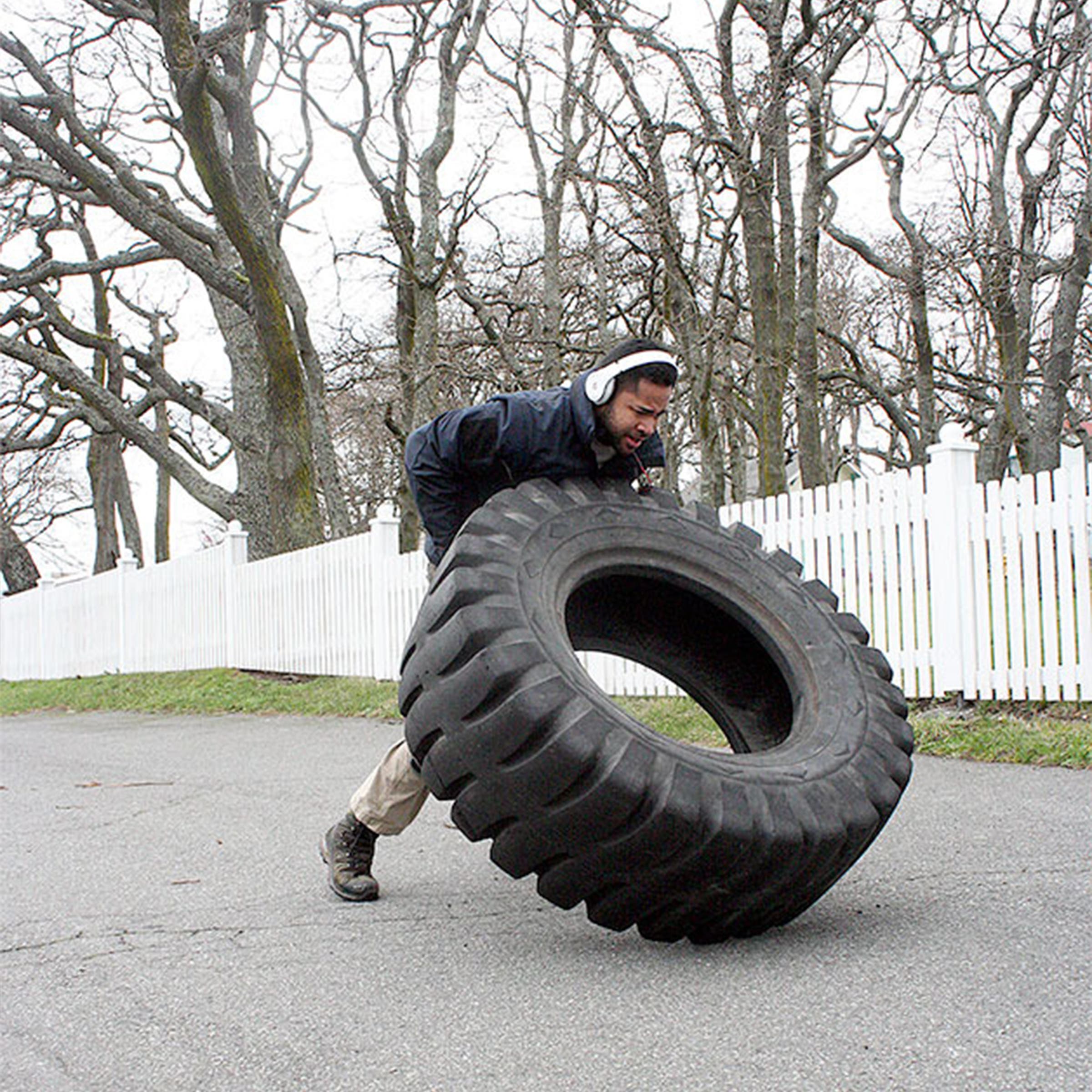 McCastle during his 13-mile tire flip