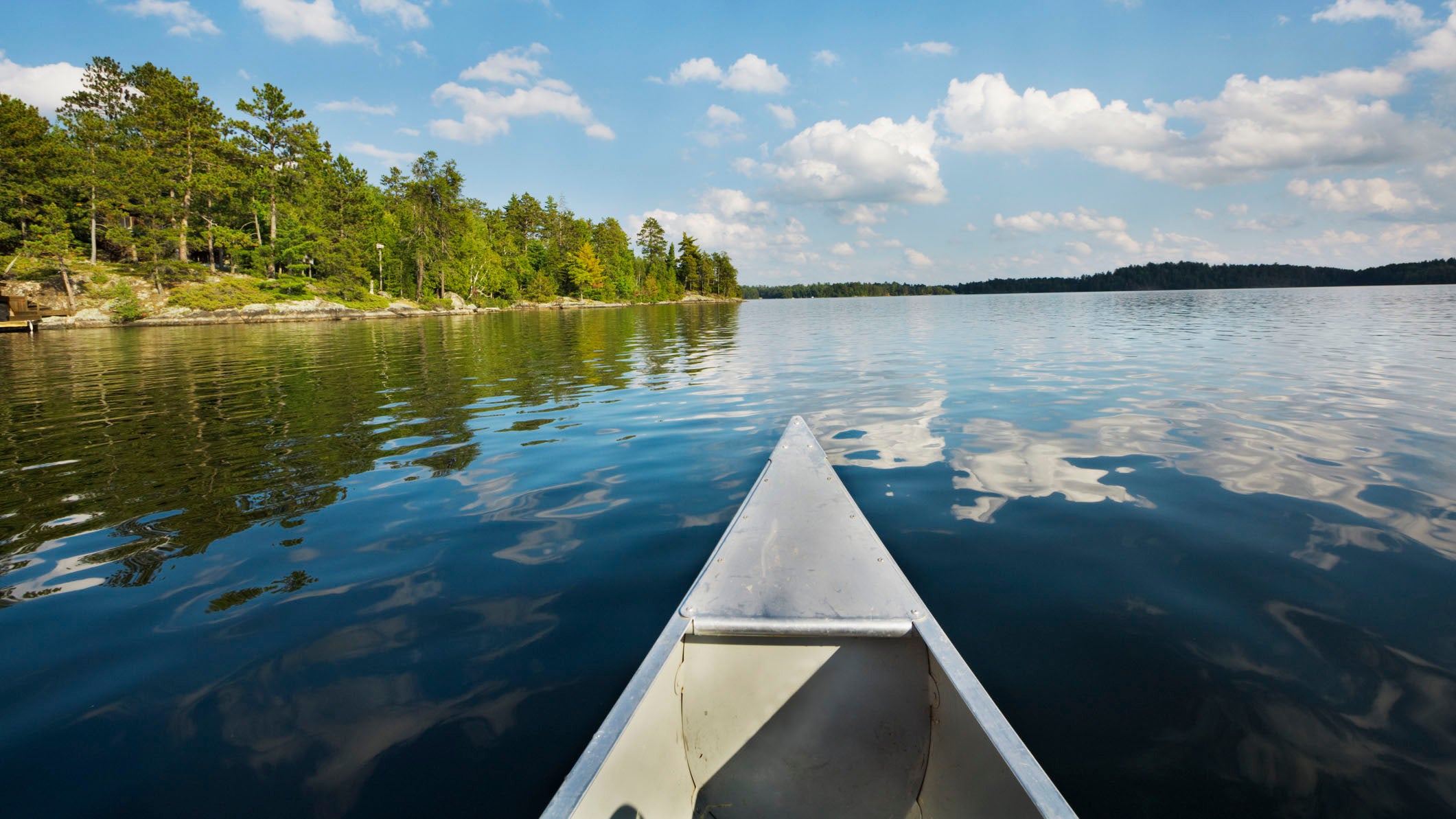 A canoe glides through the Minnesota Boundary Waters Canoe Area