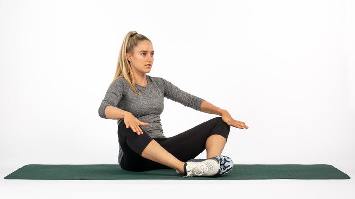 runner performing Short Adductor Stretch