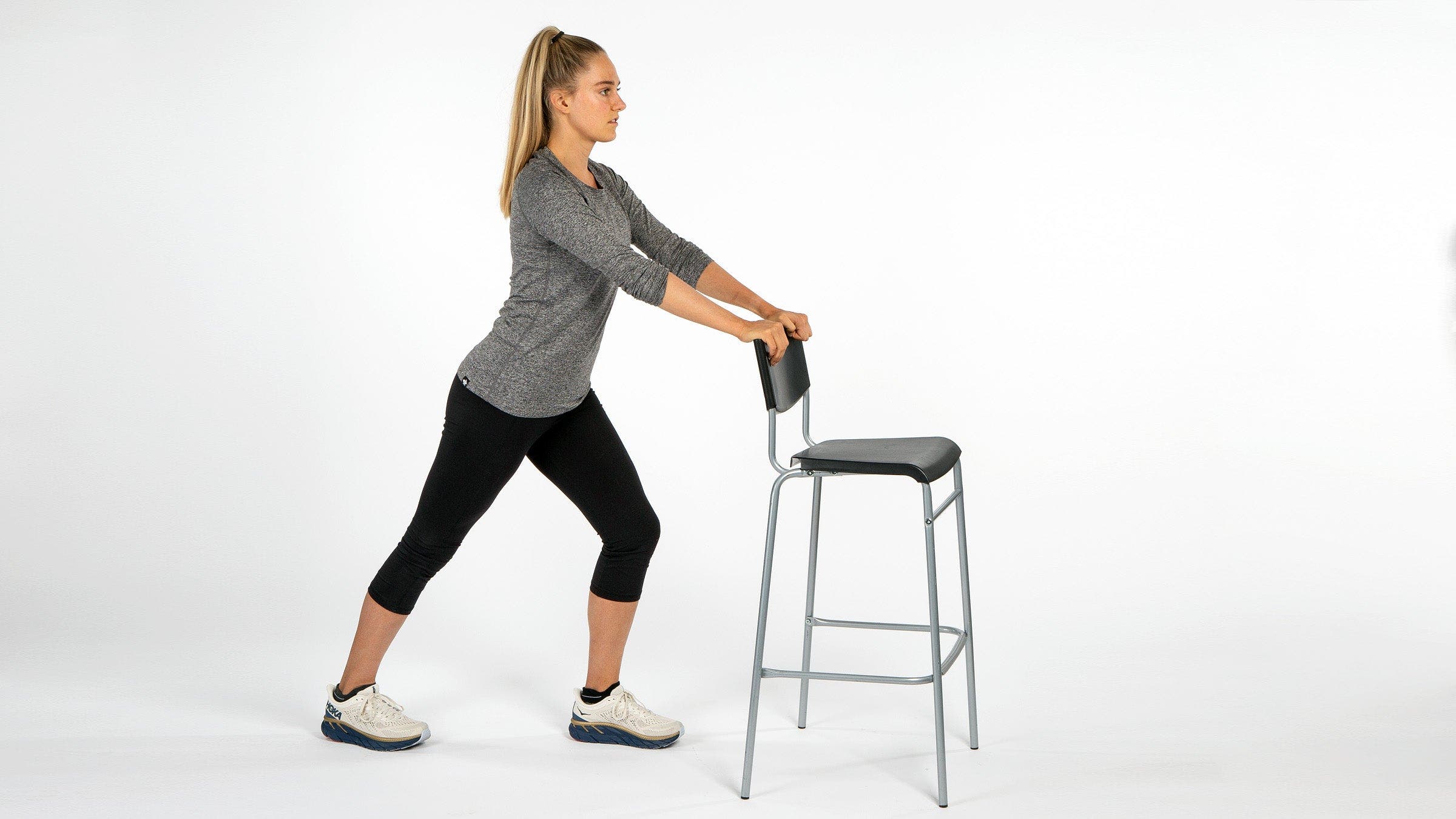 Woman performing Straight-Leg Calf Stretch