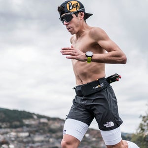 Man running in a Naked running belt