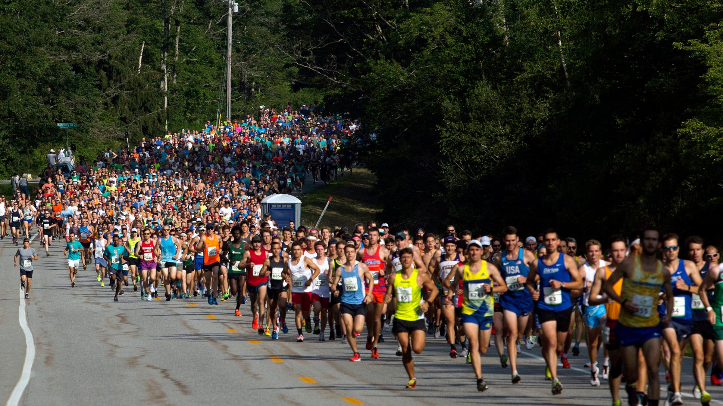 Runners race in the 2019 Beach to Beacon 10K.