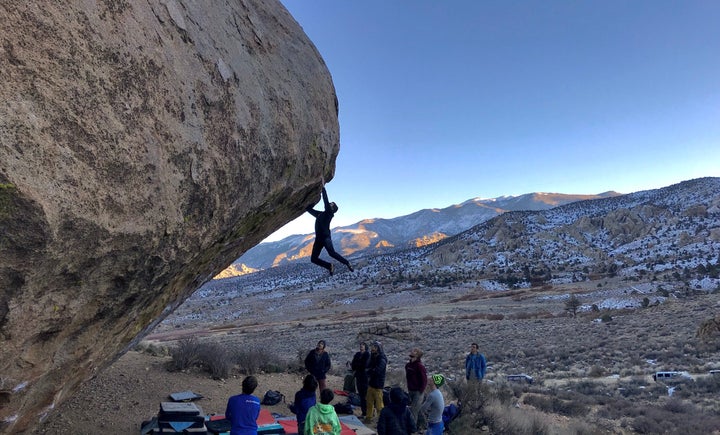 Man climbing rock in California.