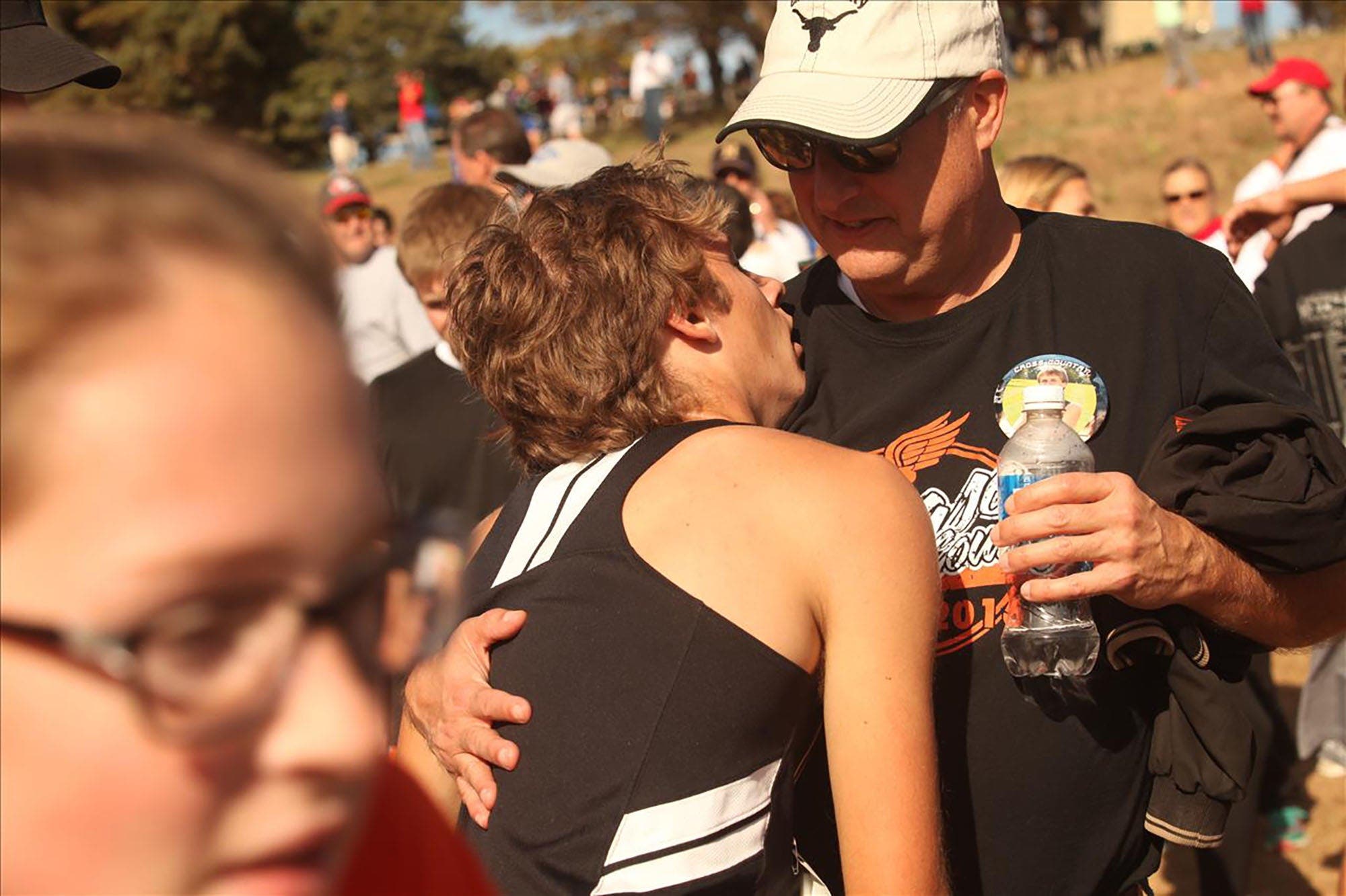 exhausted cross country runner and father
