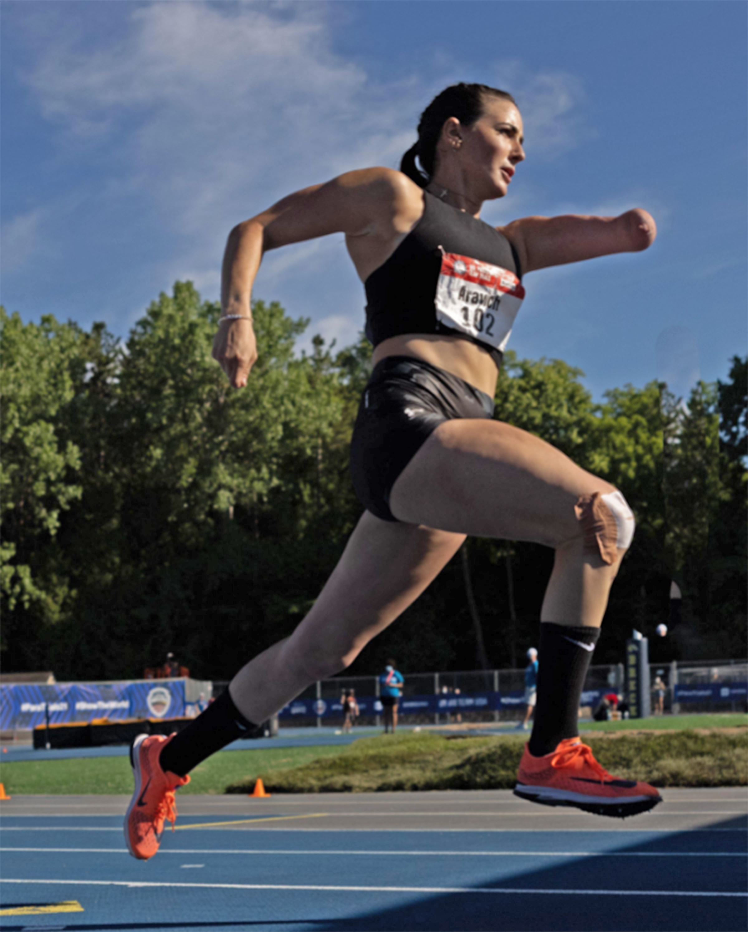 Dani Aravich, Paralympian, competing on the track.