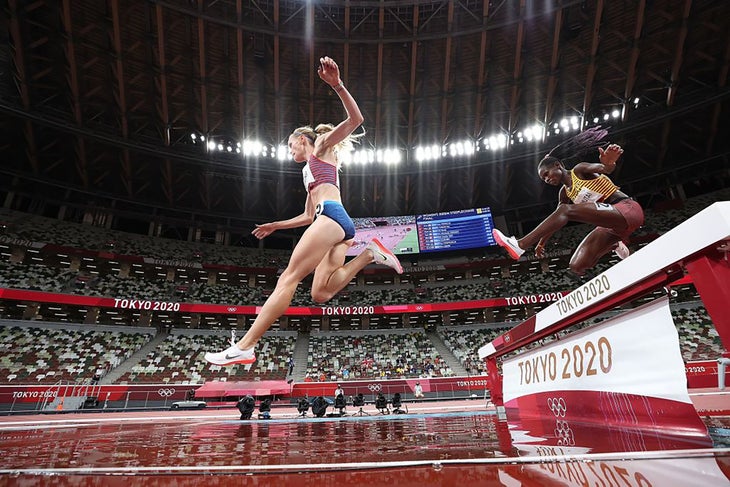Courtney Frerichs leads Peruth Chemutai during the women's 3000m steeplechase final at Tokyo 2020 Olympic Games, in Tokyo, Japan, Aug. 4, 2021.