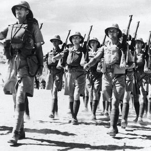 WWII army marching through desert.