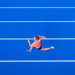 Top view of woman runner doing the Michigan Workout (probably).