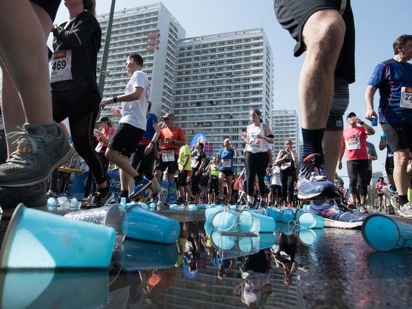 Plastic cups laying on the road during a half marathon race.