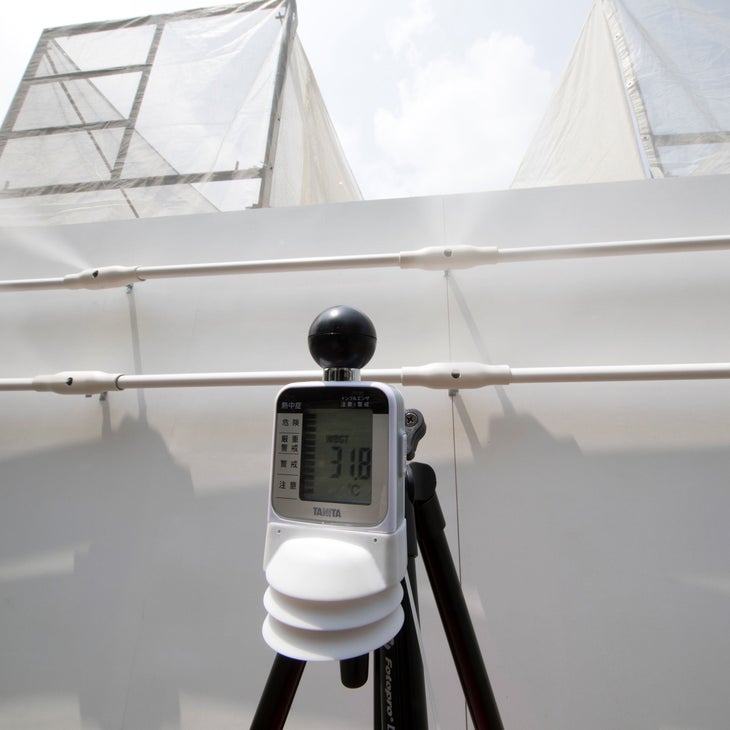 A wet-bulb globe temperature (WBGT) measure next to a mist station installed at Shiokaze Park during a beach volleyball test event for the Tokyo 2020 Olympic Games.