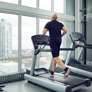 man running on treadmill