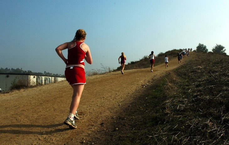 Runners scale "Reservoir Hill," the final major incline of the 2.91-mile course in the 58th Mt. San Antonio College Cross Country Invitational in Walnut, Calif.