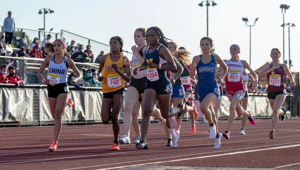 Chino Mia Chavez (453) running on the outside wins the Women 800 Meter Run and La Canada Ellaney Matarese (1221), far right, comes from behind to take second place at the Arcadia Invitational Track Meet on May 8, 2021 in Arcadia, California.